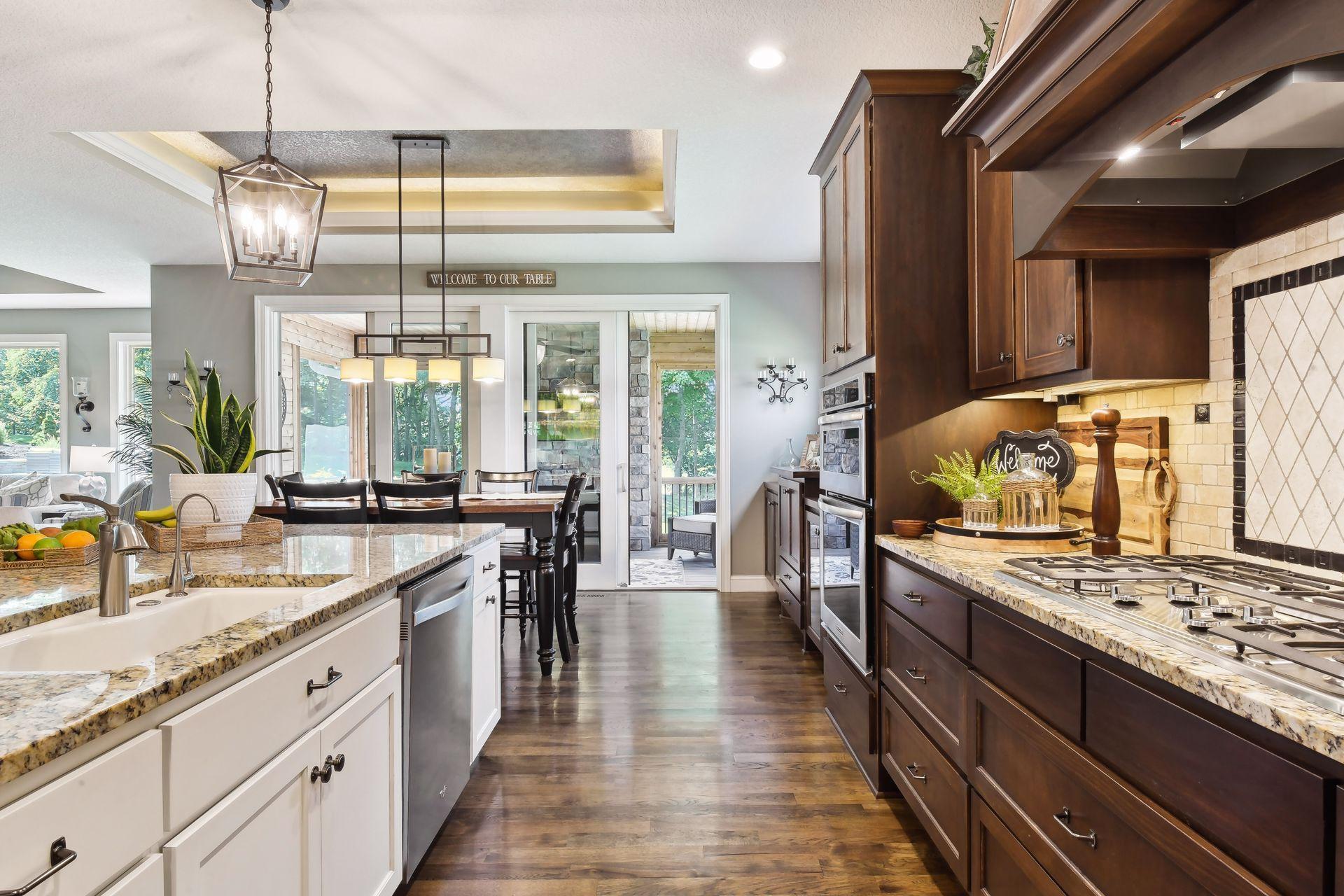 View from pantry out towards screen porch and lush backyard.