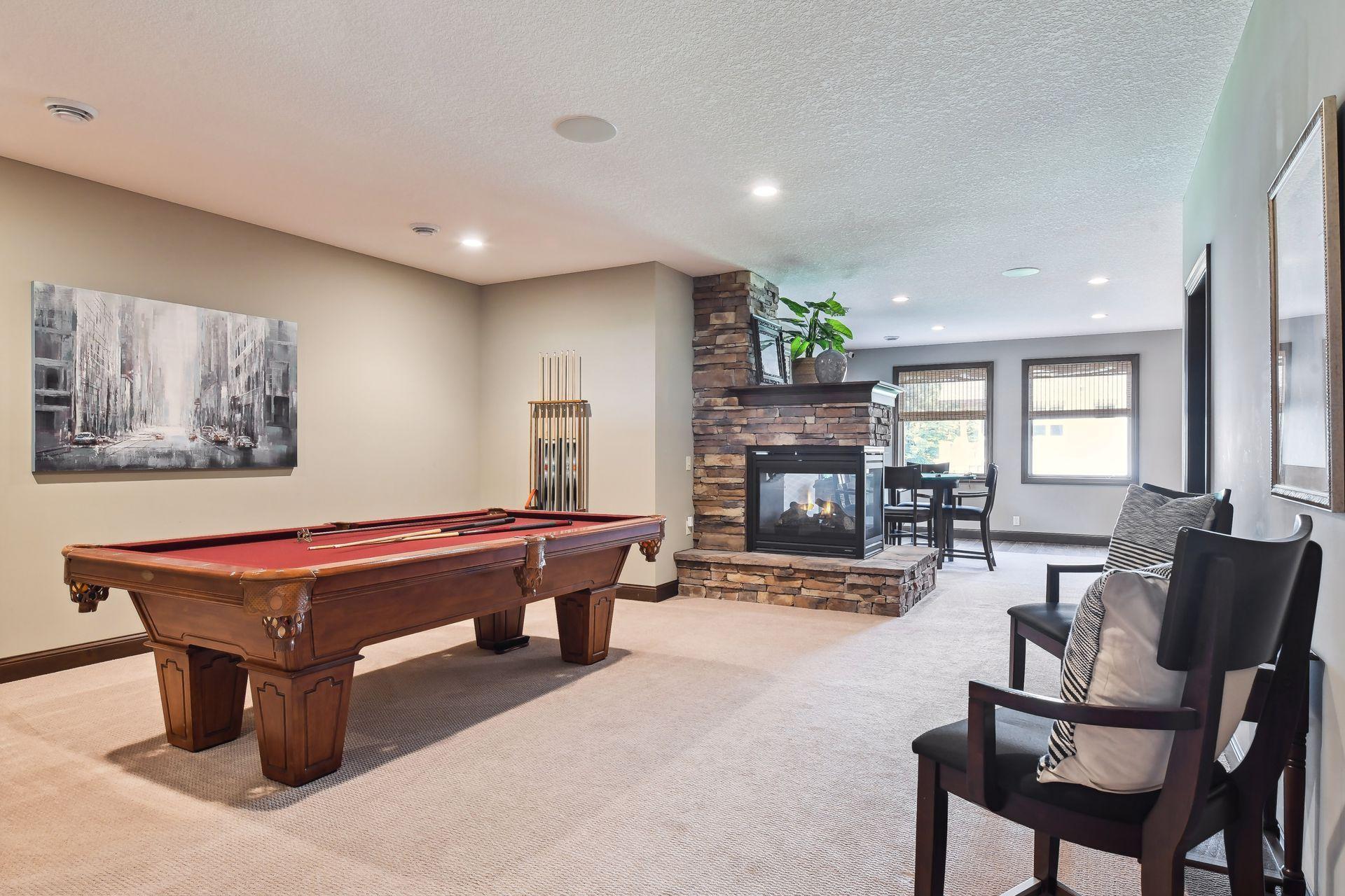 This home offers so many options for fun. Enjoy hours of playing pool in the billiard room right off the bar area.