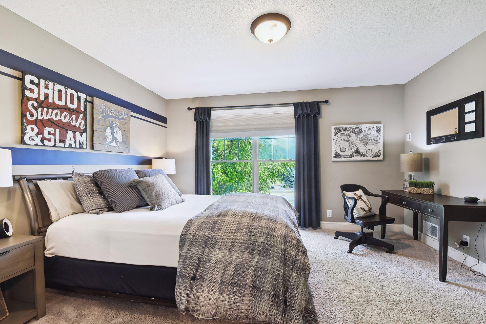 Bedroom 3 which faces the front yard, nice walk in closet and shares bathroom pass through.