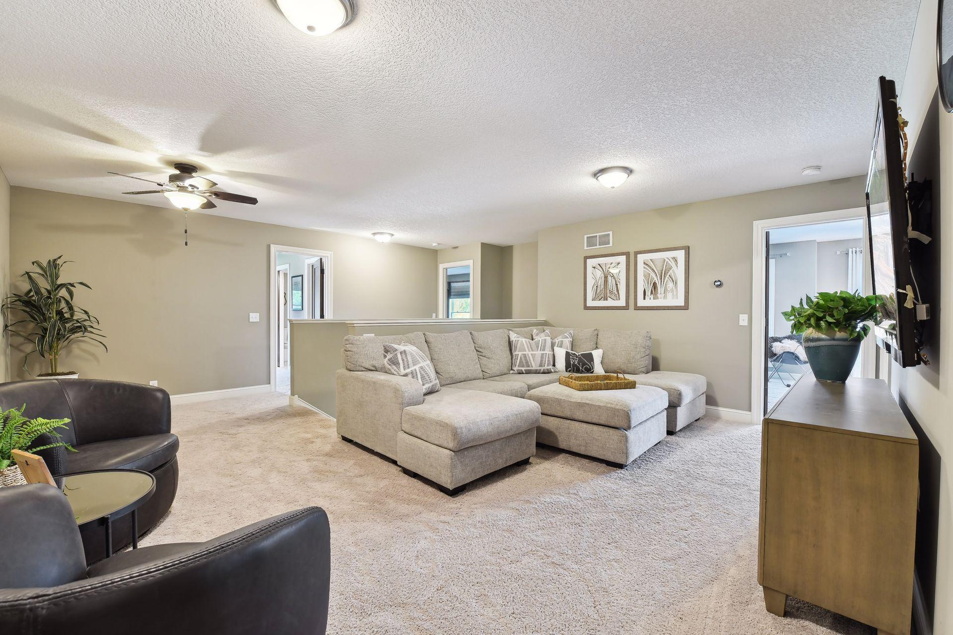 Upper level has large loft with three bedrooms, laundry and study nook/gaming room.