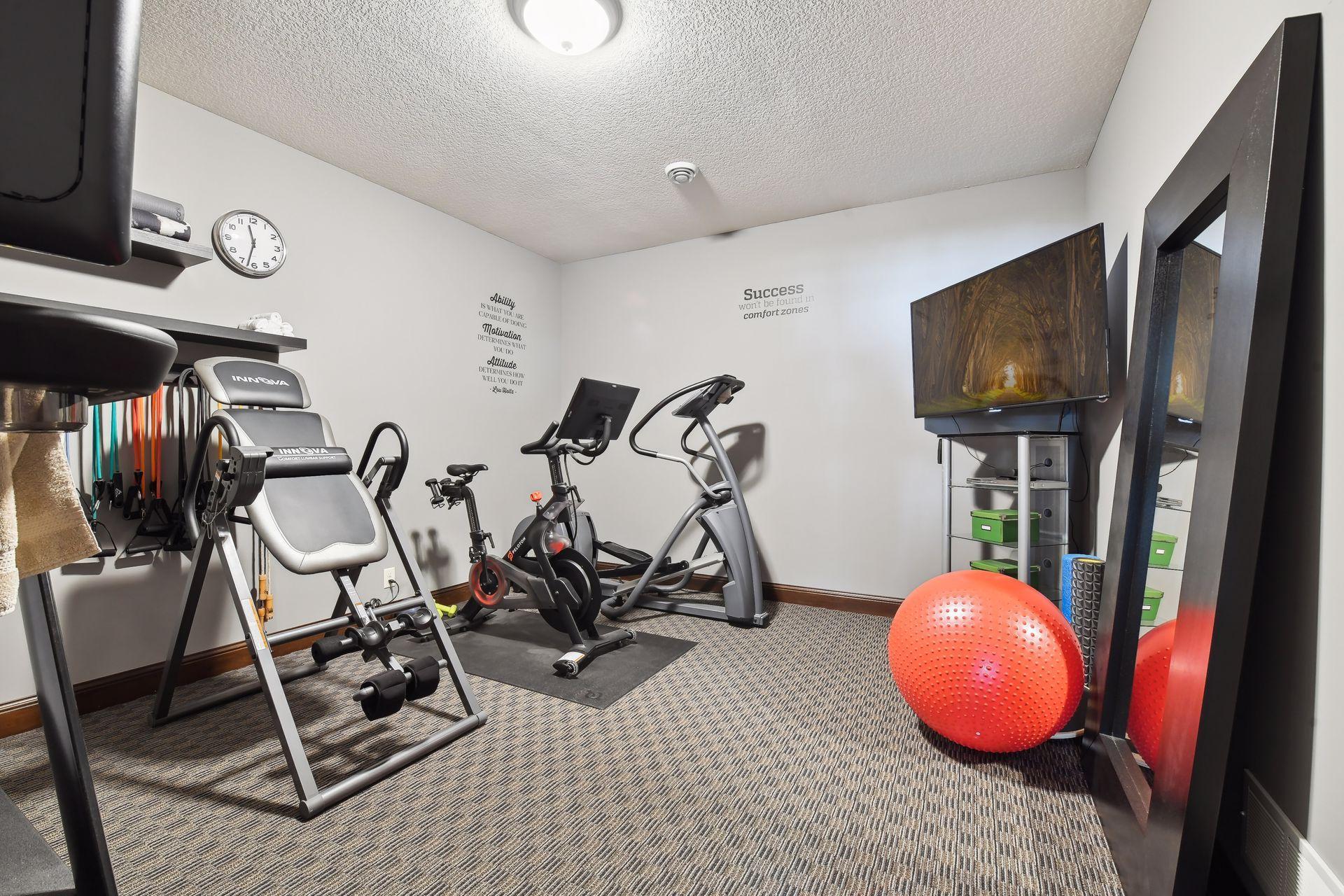 Want to drop the club membership? Enjoy your home gym and workout room.