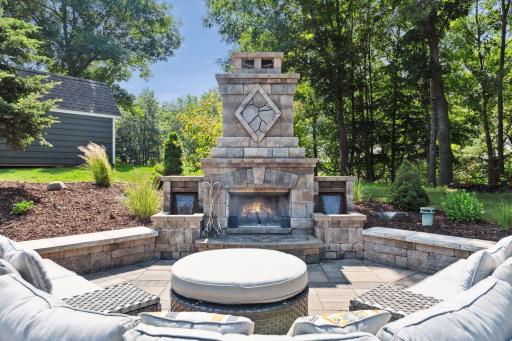 Close up view of fireplace with water fall features. Bring the wine or beverage of choice to simply relax and be surrounded by nature, and water