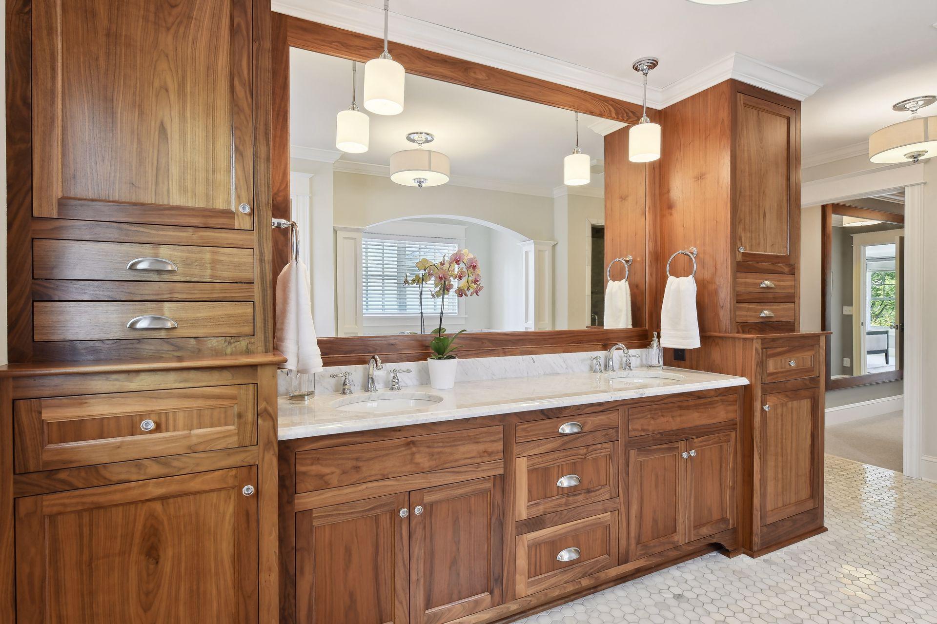 Double sinks and beautiful wood cabinetry