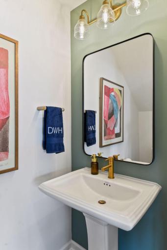 The powder room is a perfect addition to the main floor. This picture is from the model home.