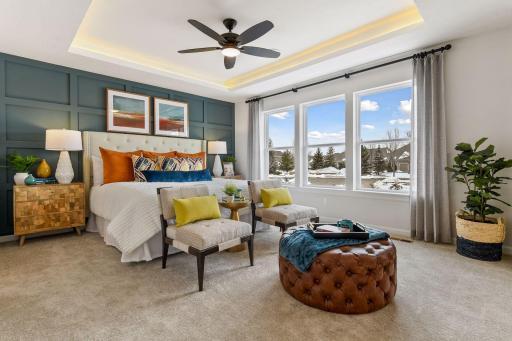 Over-sized windows, vaulted ceiling and fan are only a few of the included features you will find in this fabulous owner's retreat. This picture is from the model home.