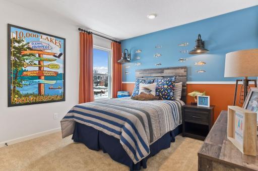 Imagination can add wonders to a bedroom for a person of any age! This picture is from the model home.