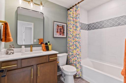 A second full bath conveniently located near the secondary bedrooms. This picture is from the model home.