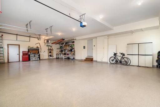 The 4 car garage offers epoxy floors, insulation and heat.