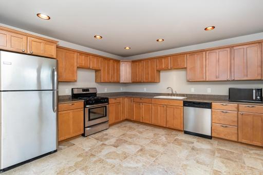 To top off the list of features provided by this home is the accessory dwelling unit (expansive apt) above the garage. Access is by a beautiful set of stairs off the garage entrance. It includes BR, full BA with w/d hookups, family room overlooking w