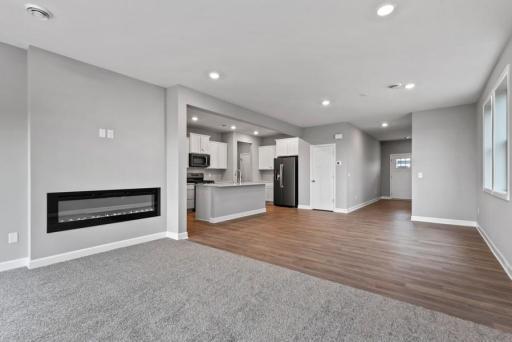 *Model Home - finishes may vary* Spacious Great room featuring an electric fireplace.