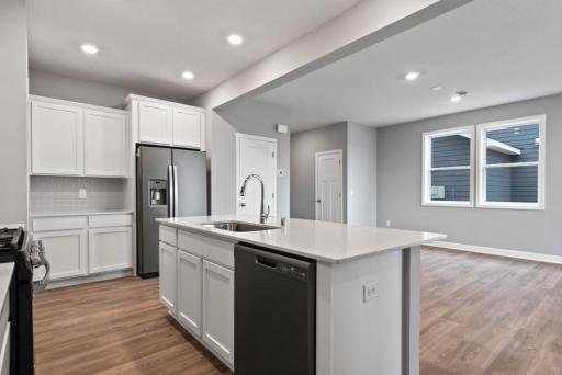 *Model Home - finishes may vary* Easily entertain with this open-concept kitchen, combined with the large dinette area. There’s plenty of space to gather with friends and family!
