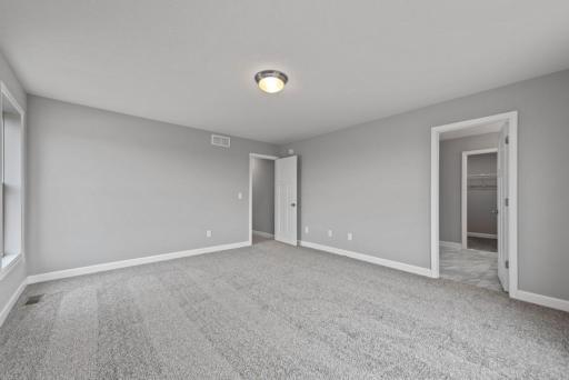 *Model Home - finishes may vary* The primary suite is on its own side of the home. Allowing for privacy with a large double sink vanity, linen closet and walk-in closet.