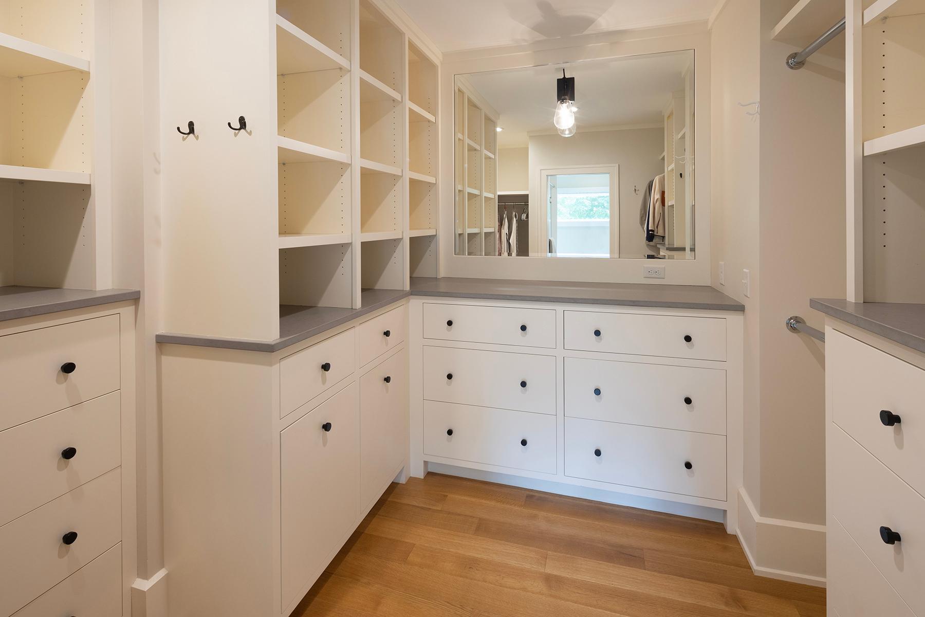 Primary Suite Walk-in closet with built-ins