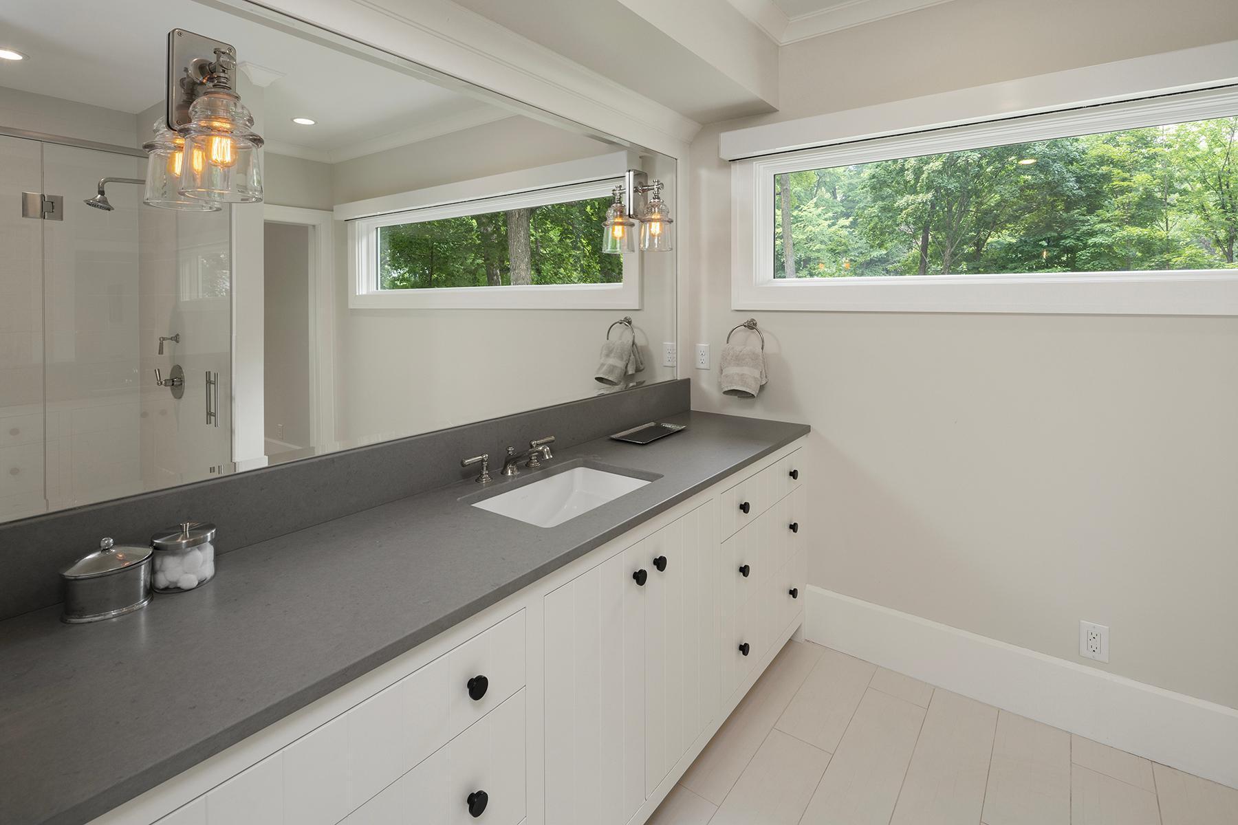 Private Primary Suite Bathroom with walk-in shower and heated floors