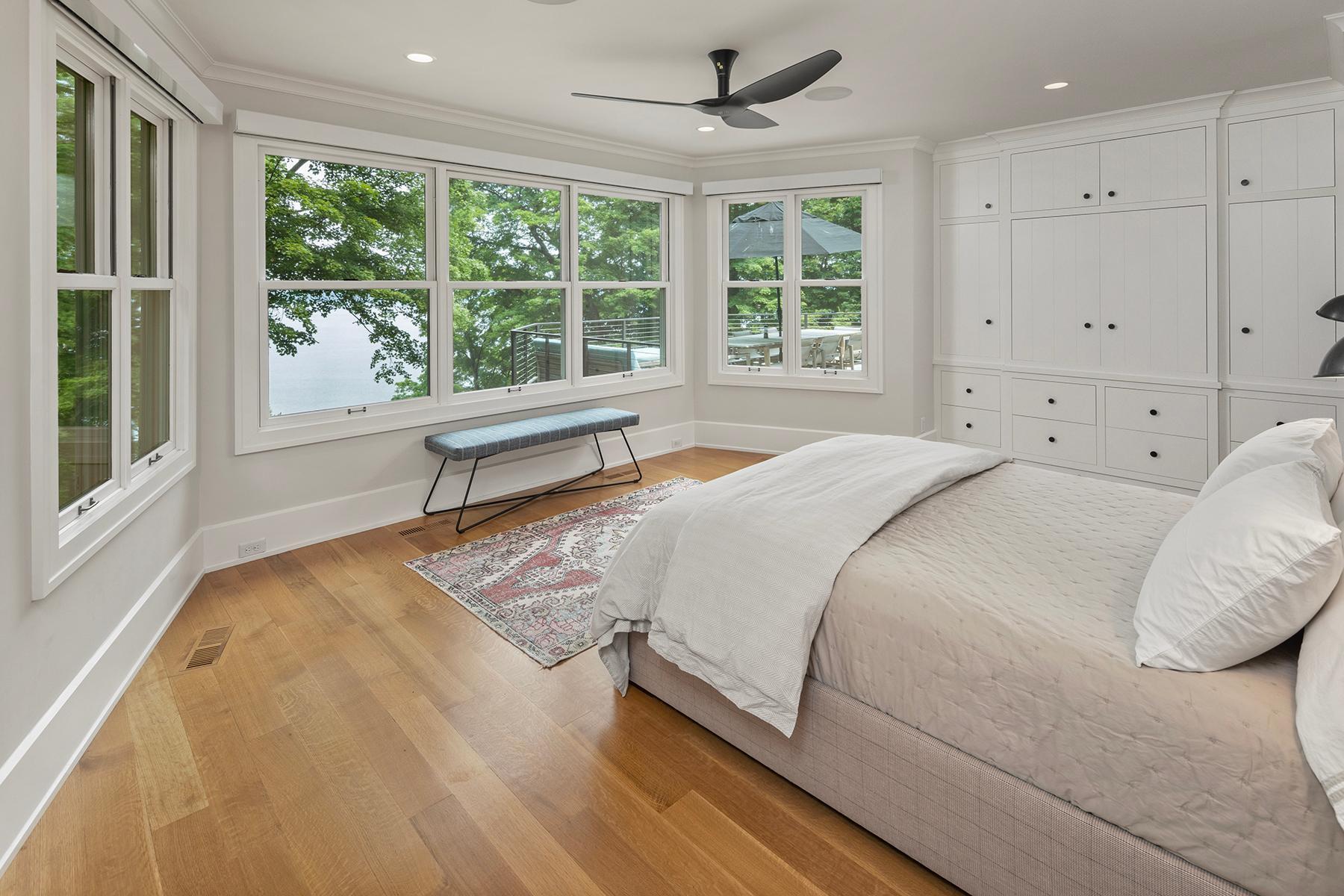 Main Level Primary Suite with views of lake