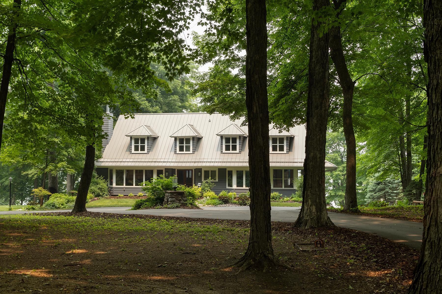Enchanting setting next to wooded privacy on Lake Minnetonka