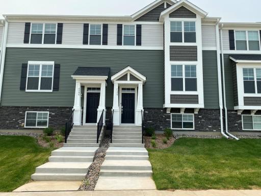 Move-in ready, 3 bedroom townhome in Oakdale's newest community! Upgraded white cabinetry, quartz countertops and slate appliances with a gas range and beautiful view of the wetland!