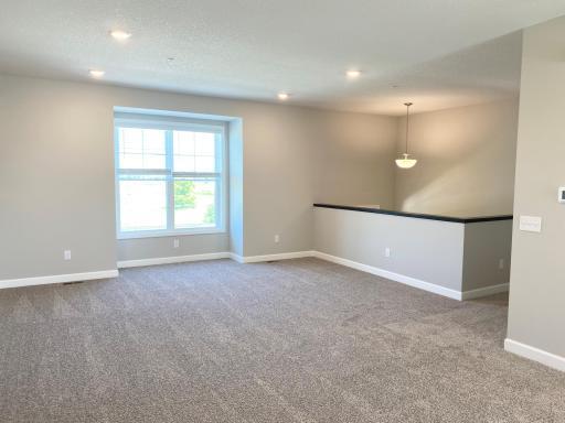 Large family room with a beautiful view of the wetland!