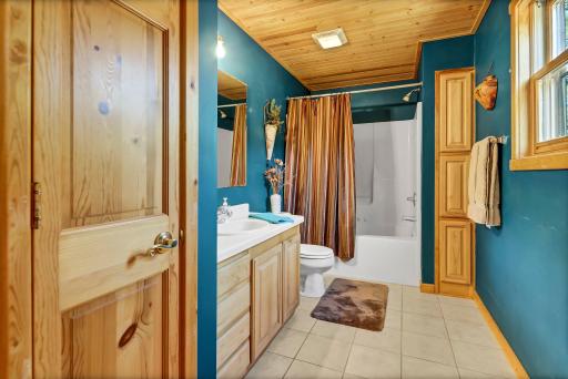 Main floor full bathroom is attached to owners suite