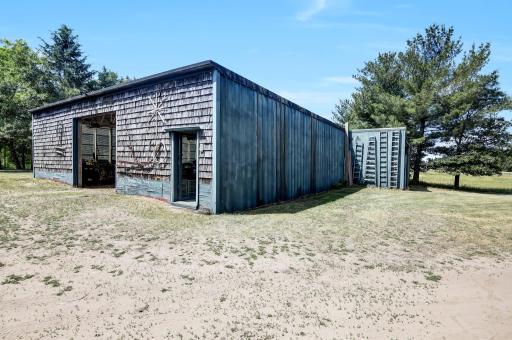 Back portion of the barn has livestock stalls