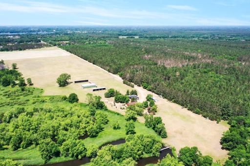 View of Sand Dunes State Forest, St. Francis River Front, Farm, and pastures