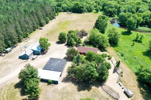 Home, barn, raised gardens, machine shed and a glimpse of the bridge over St. Francis River
