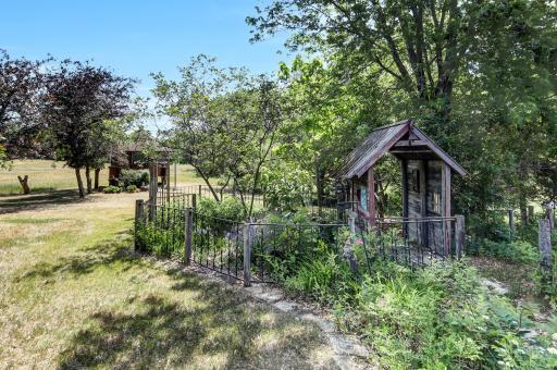 Gardens everywhere with fencing and charming places to sit and take it all in!
