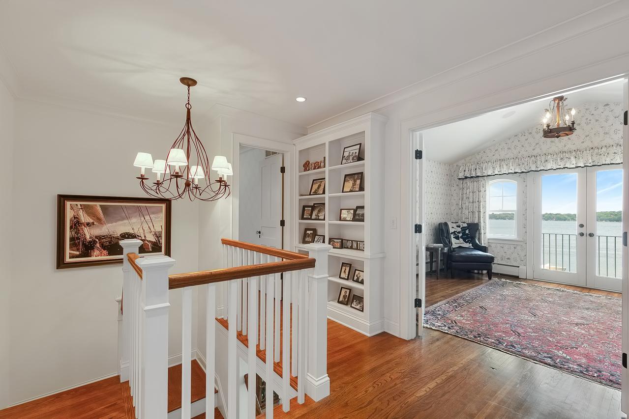Custom book shelves upper hallway