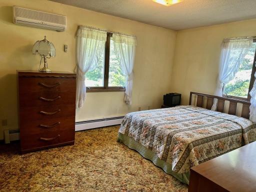Large bedroom w/ double closet! You'll also find a ductless AC unit