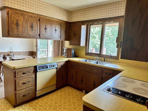 kitchen with window looking out to the backyard