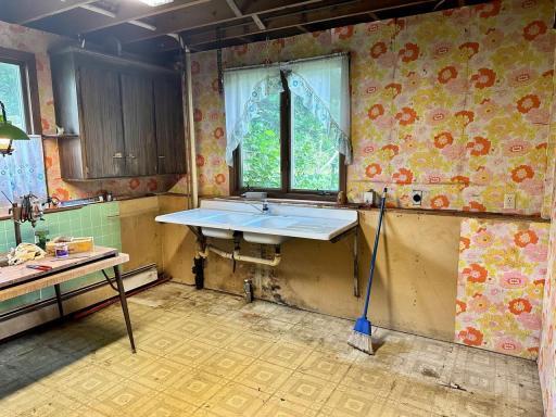 This area in the lower level would be great for a 2nd kitchen