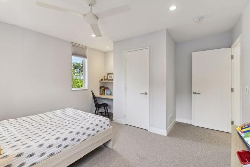 Second bedroom also features a built in desk and book shelf.