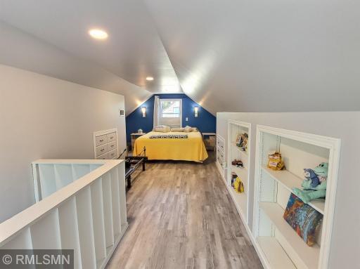 Stunning bedroom with new sheetrock, vinyl flooring, and spray foamed insulated attic. Recessed lighting and perfectly placed windows for the sunlight to shine in.