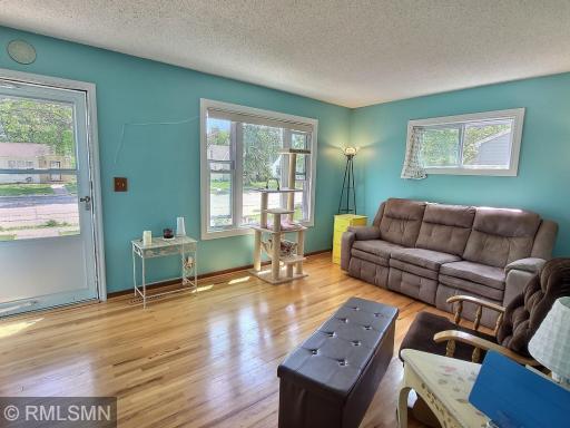 Enter through the front door and be welcomed by the natural sunlight giving a breath of fresh air into this great living room.