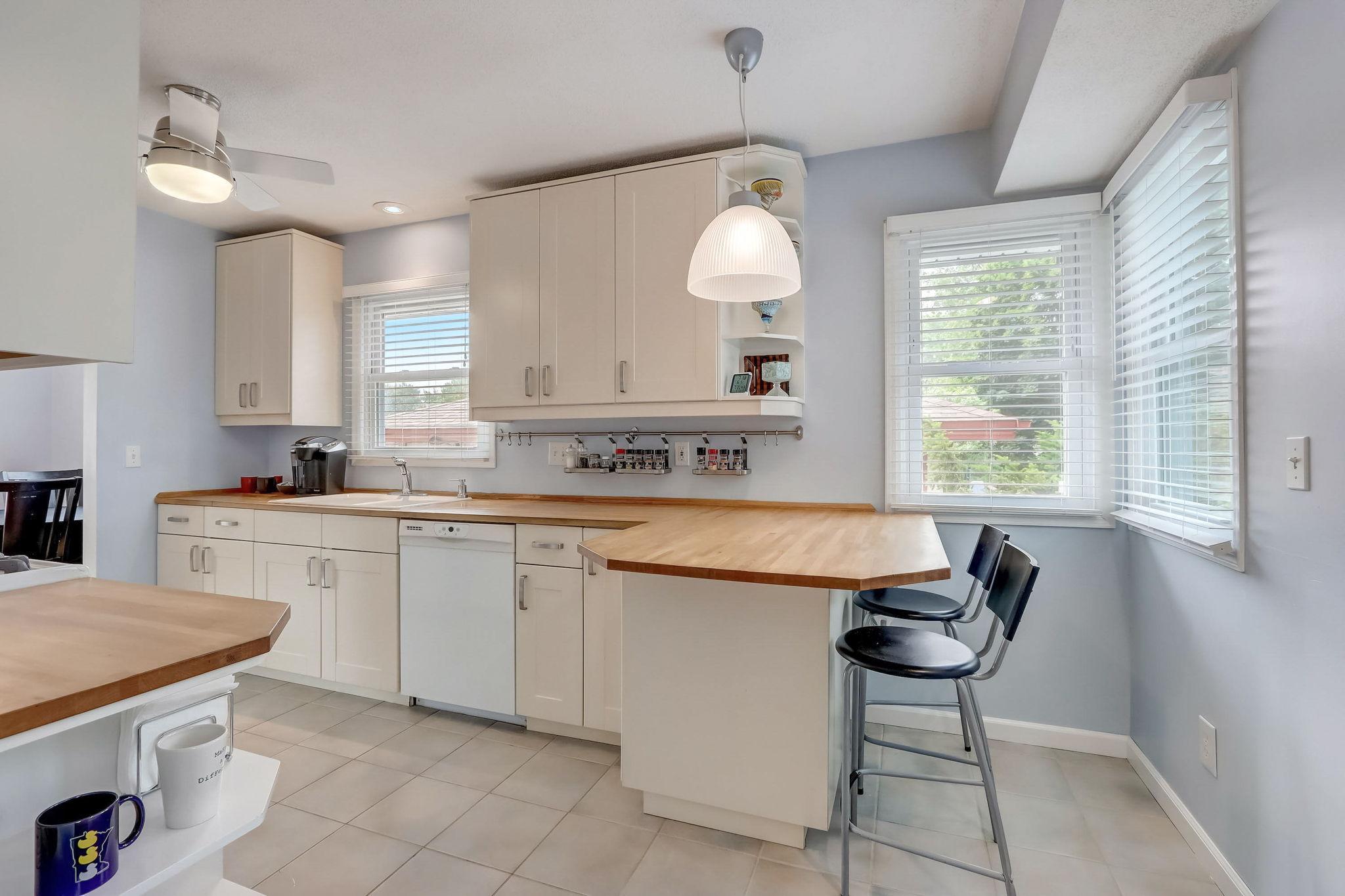 Several windows provide tons of natural light, and views of the backyard.