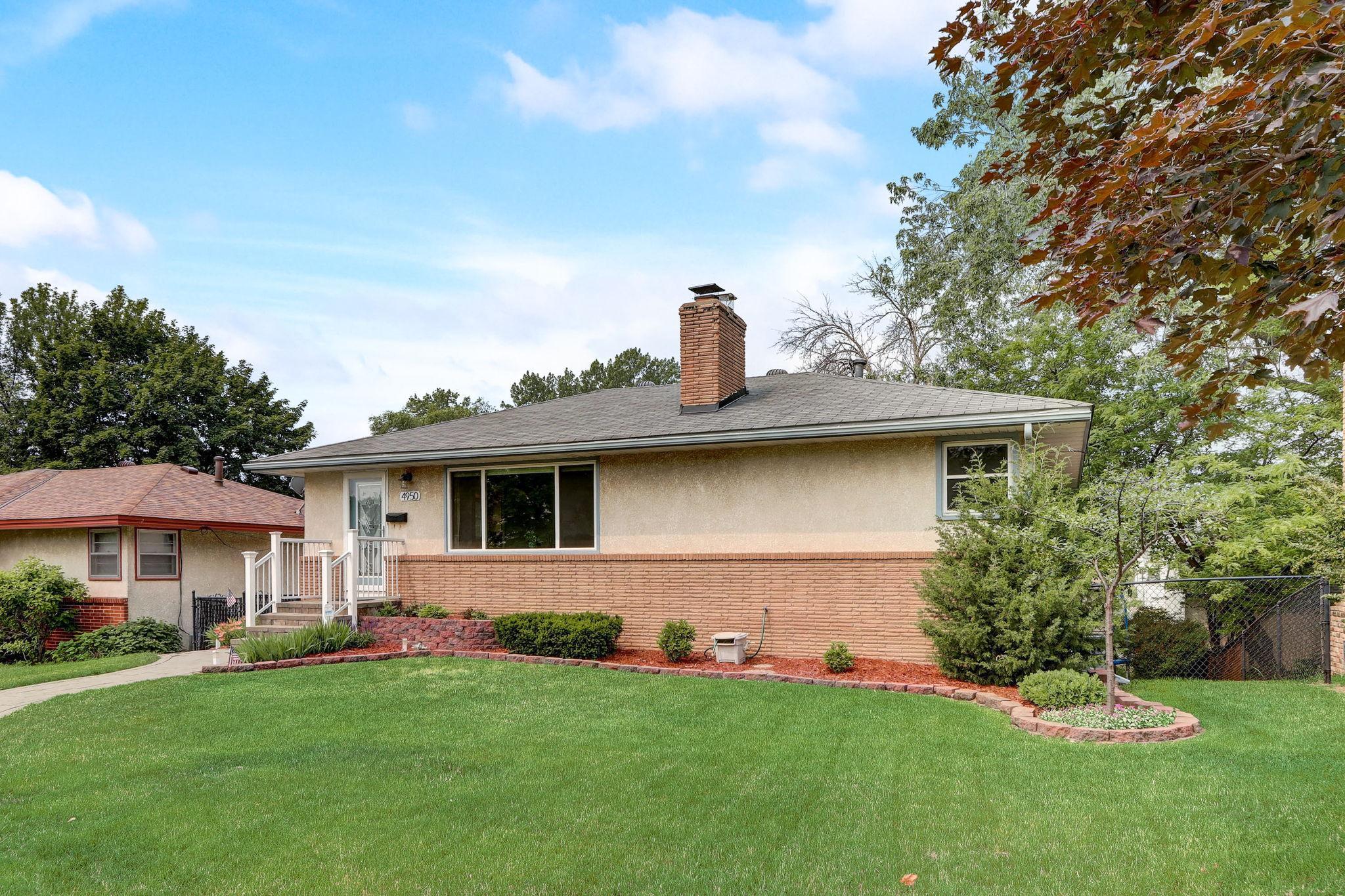 This absolutely beautiful, well-cared-for, walkout rambler awaits its new owners! Impressive curb appeal with gorgeous landscaping, a paver walkway, and classic charm with a brick accented exterior.