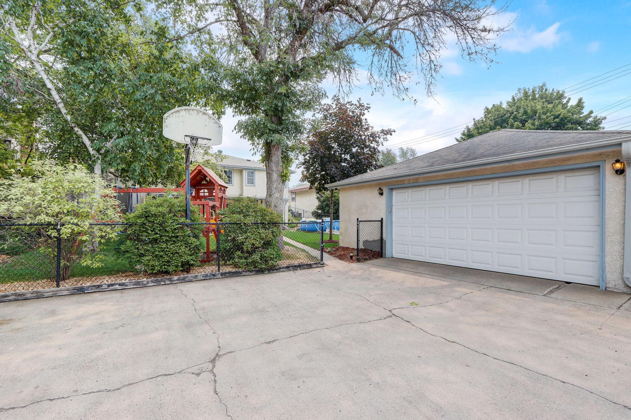 Oversized 26x24 detached garage and large private driveway.