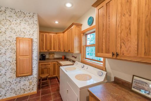 Convenient and spacious main floor laundry also serves as entry from the attached garage.