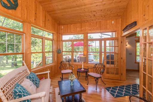 The sunroom serves as a cozy room to enjoy some relaxation taking in the lake view, read a book, enjoy some conversation. In the winter it provides a wonderful room to take in the sun.