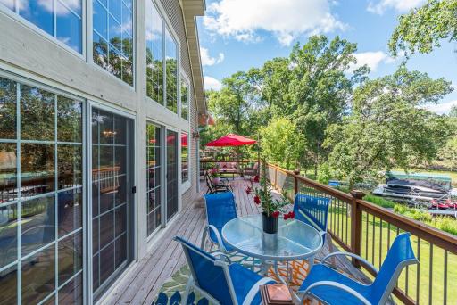 You will enjoy countless hours on the deck which has several gathering spots and you can watch your family enjoying the lake .