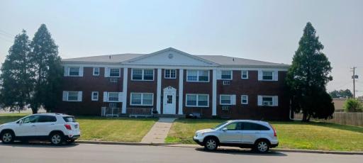 Great looking 2 story apartment building with 6 two bedrooms & 4 one bedroom units