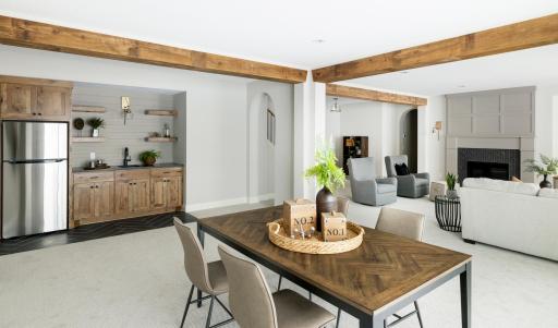 Lower Level Wet Bar with Game Area and Family Room *photo of like home
