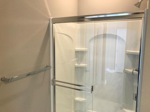 Main level guest bath with step-in low maintenance shower. Finishes will vary.jpg