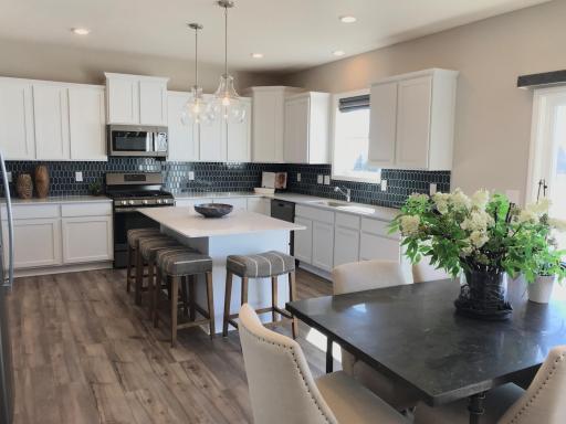 Soft close cabinet doors, luxury vinyl plank flooring, and quality quartz counter tops...all included!.jpg