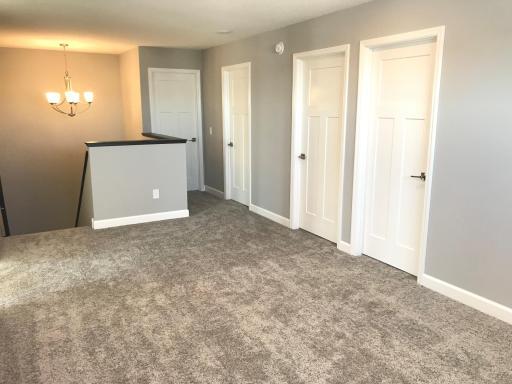 Great upper level loft space awaits your decor and furnishings. Finishes will vary.