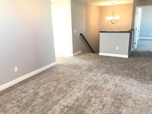 Great upper level loft space all set for your family needs! Finishes will vary.