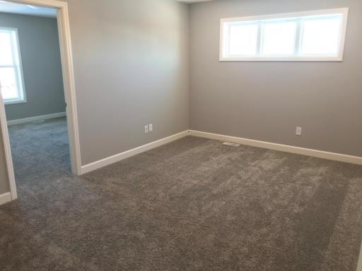 Another look at the upper level loft space all set for your family needs! Finishes will vary.