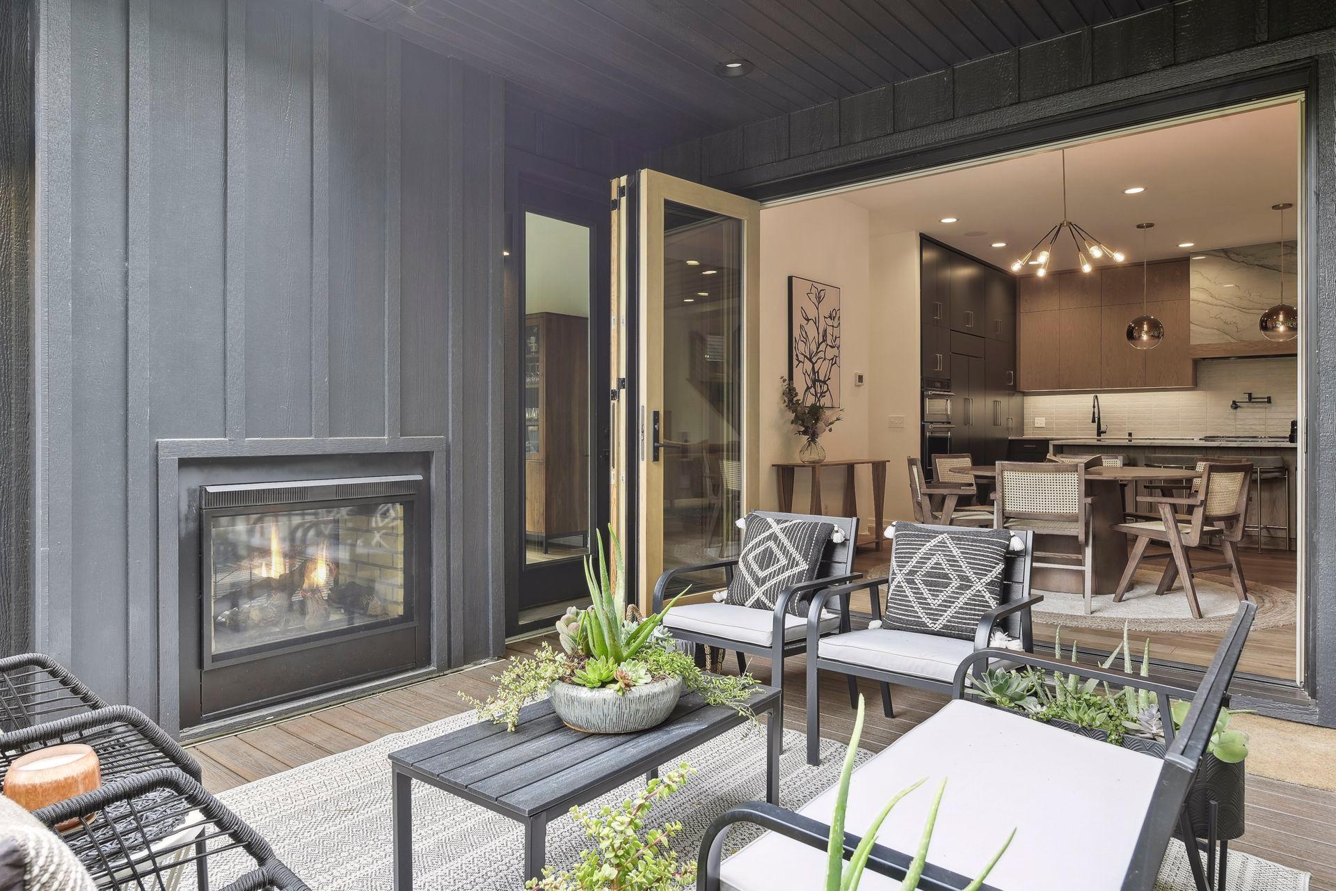 The Marvin scenic doors opens up to allow contemporary indoor and outdoor living. The two-sided fireplace allows for extended use of the deck in the Spring and Fall.