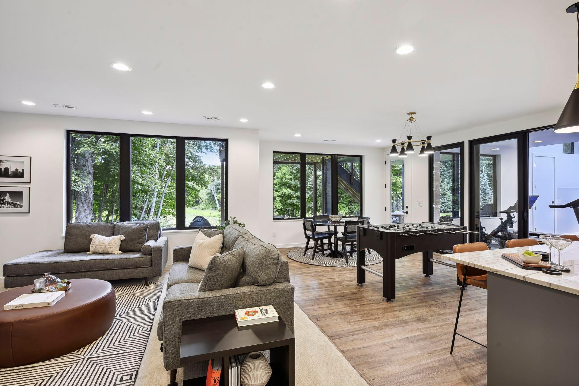 The basement is an entertainers delight with a full bar and multiple flexible social spaces.