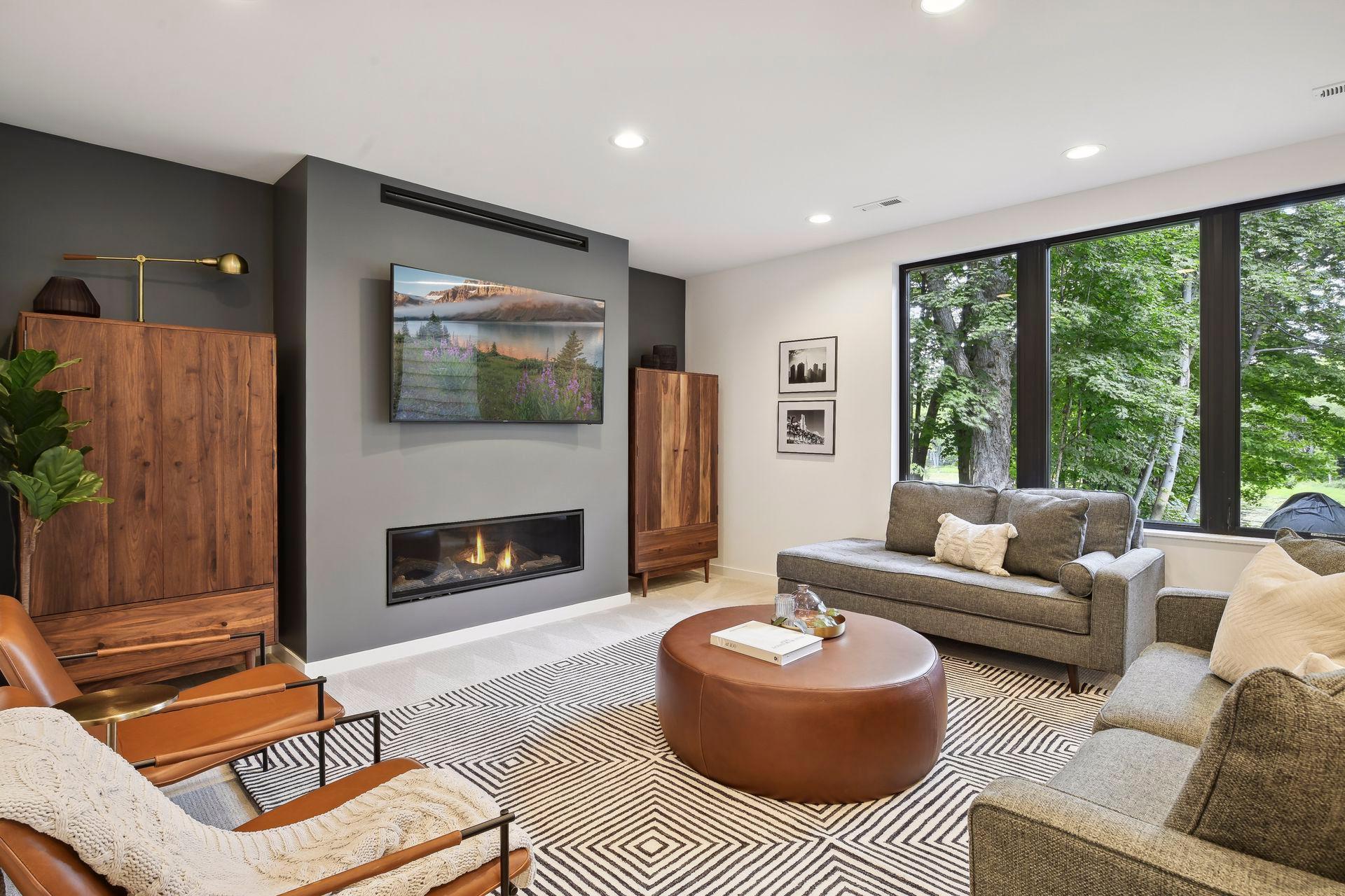 The basement is an entertainers delight with a full bar and multiple flexible social spaces.